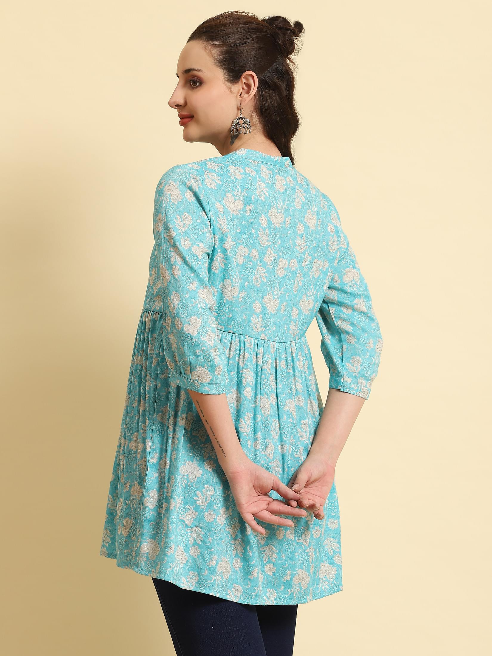 Women Sky Blue Floral Printed Tunic.