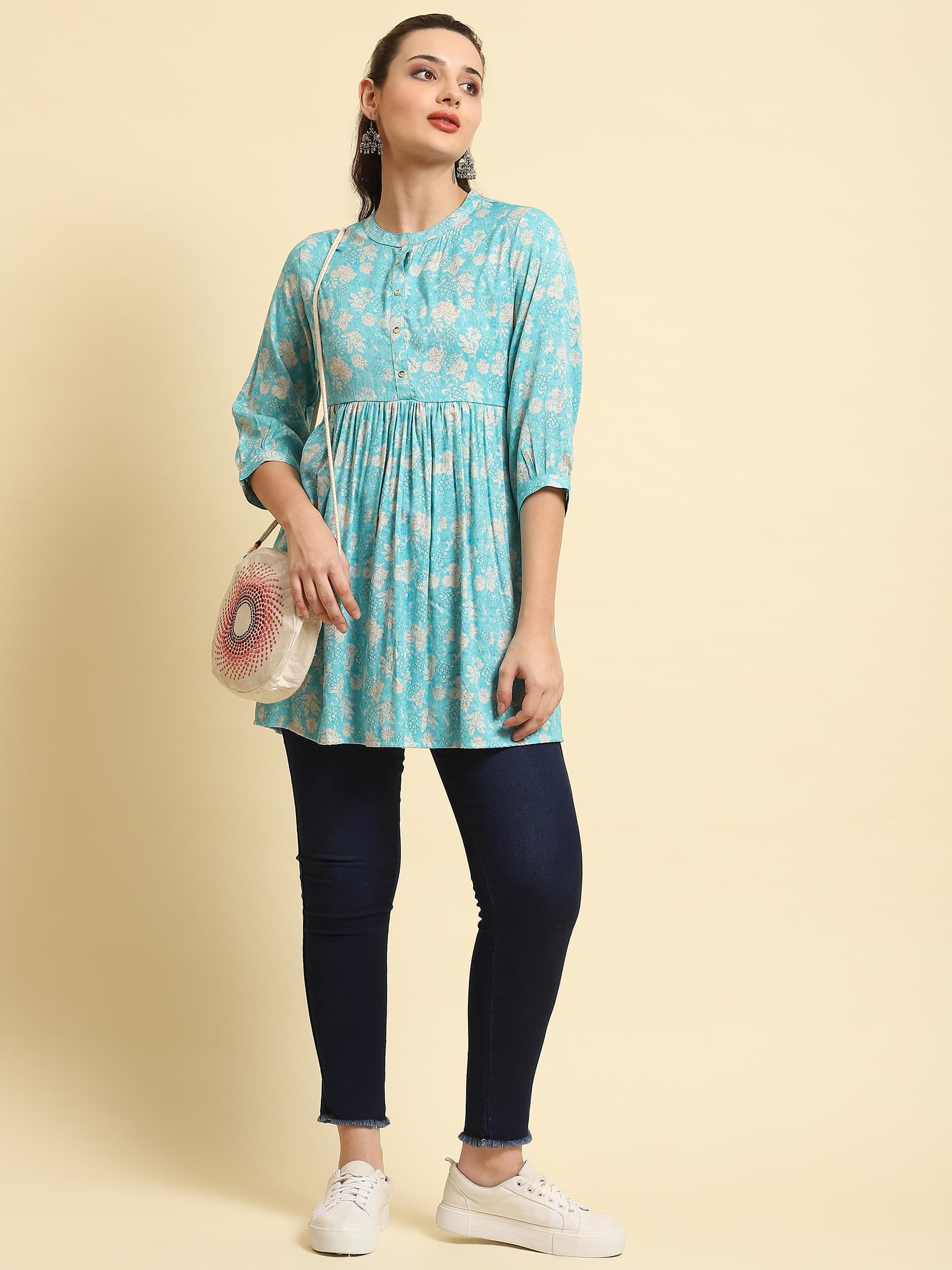 Women Sky Blue Floral Printed Tunic.