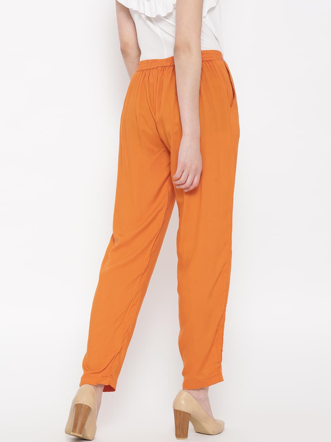 Women Orange Rayon Solid Trouser.