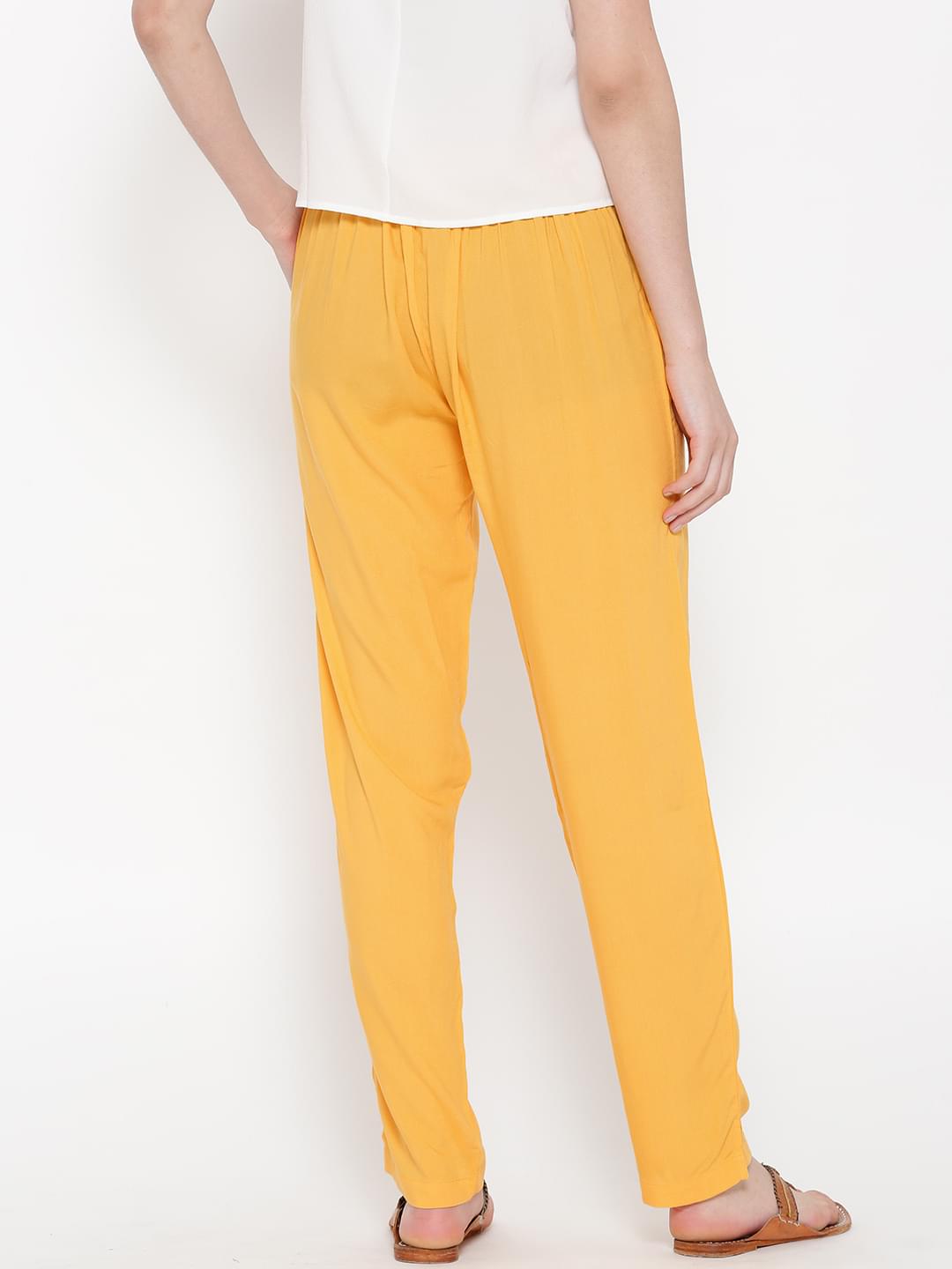 Women Yellow Rayon Solid Trouser.