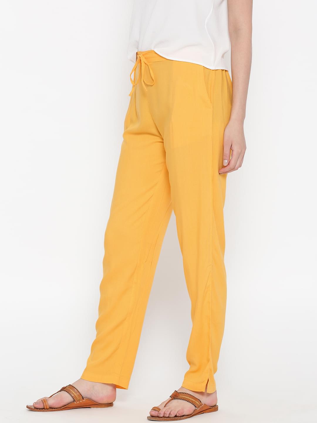 Women Yellow Rayon Solid Trouser.