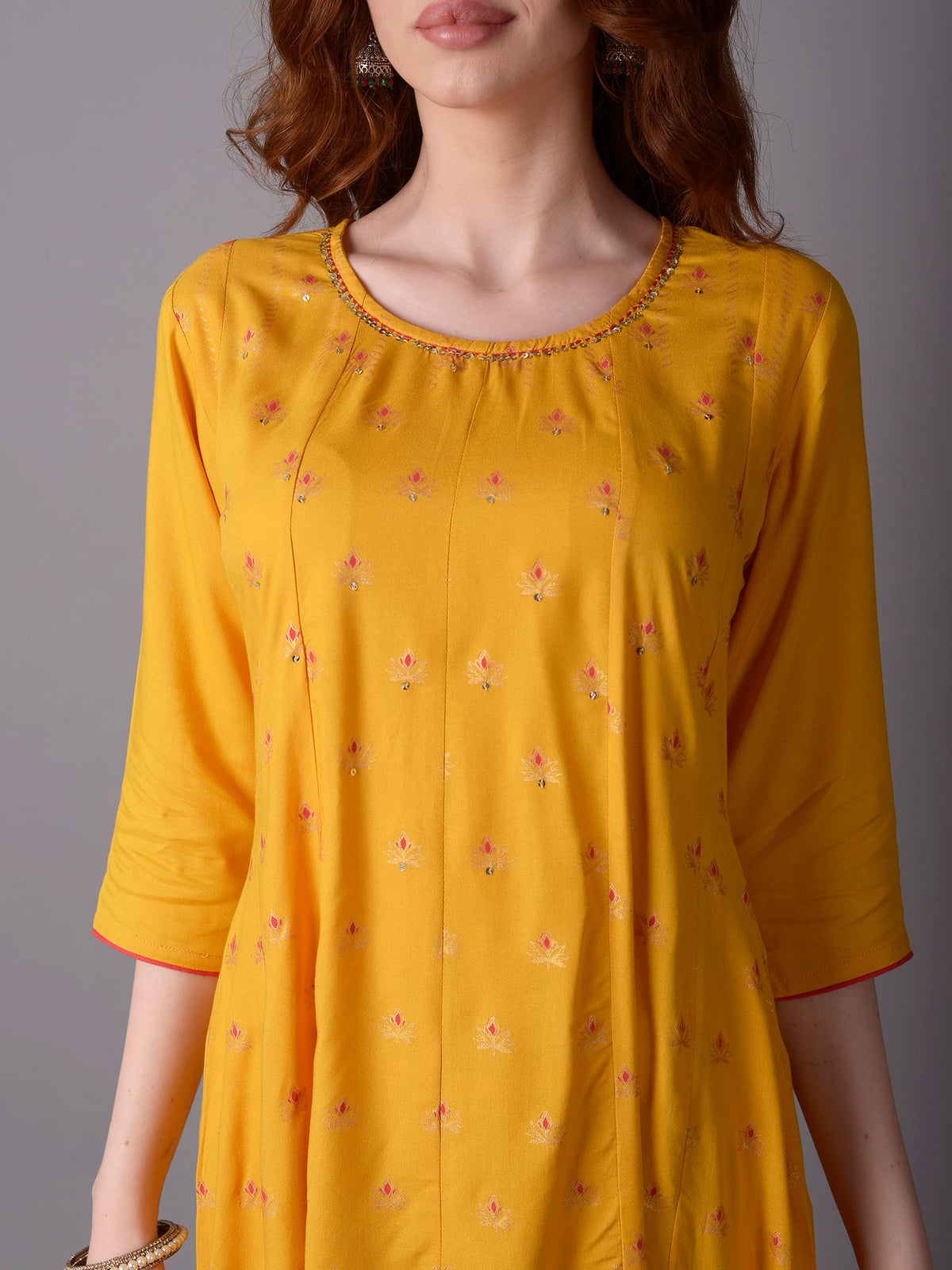 Women Mustard Ornamental Printed Kurta With Trouser.