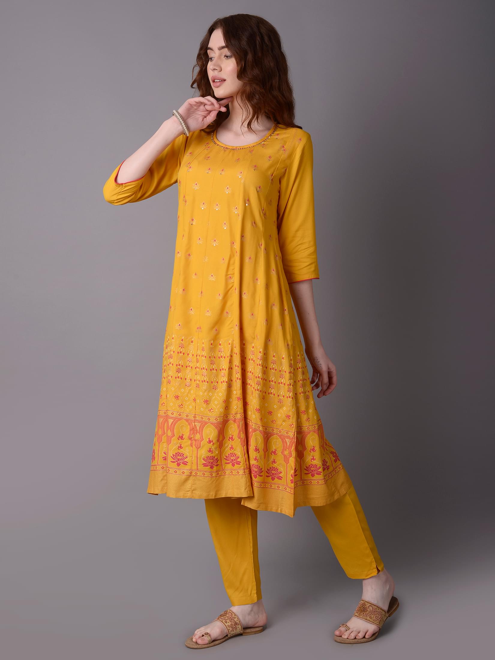 Women Mustard Ornamental Printed Kurta With Trouser.