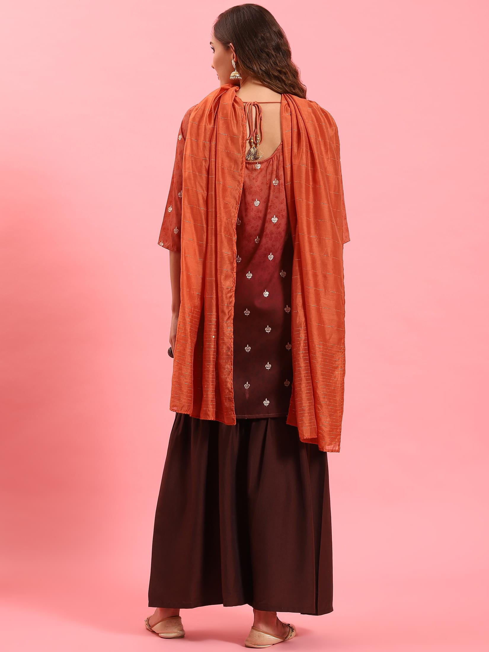 Women Rust Ornamental Printed Kurta Sharara Dupatta.