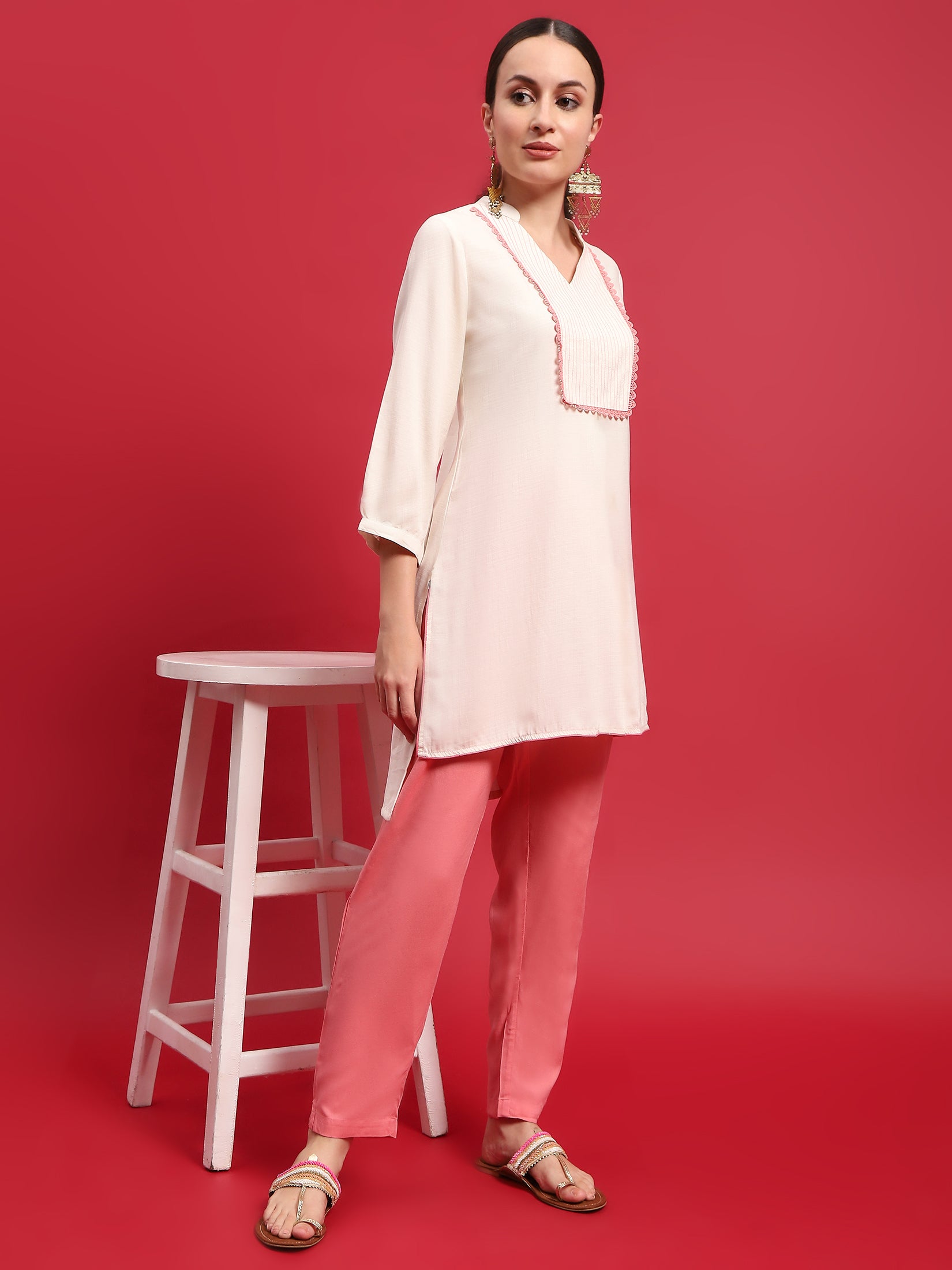 Women Liva Rayon Cream Solid Kurta With Trouser