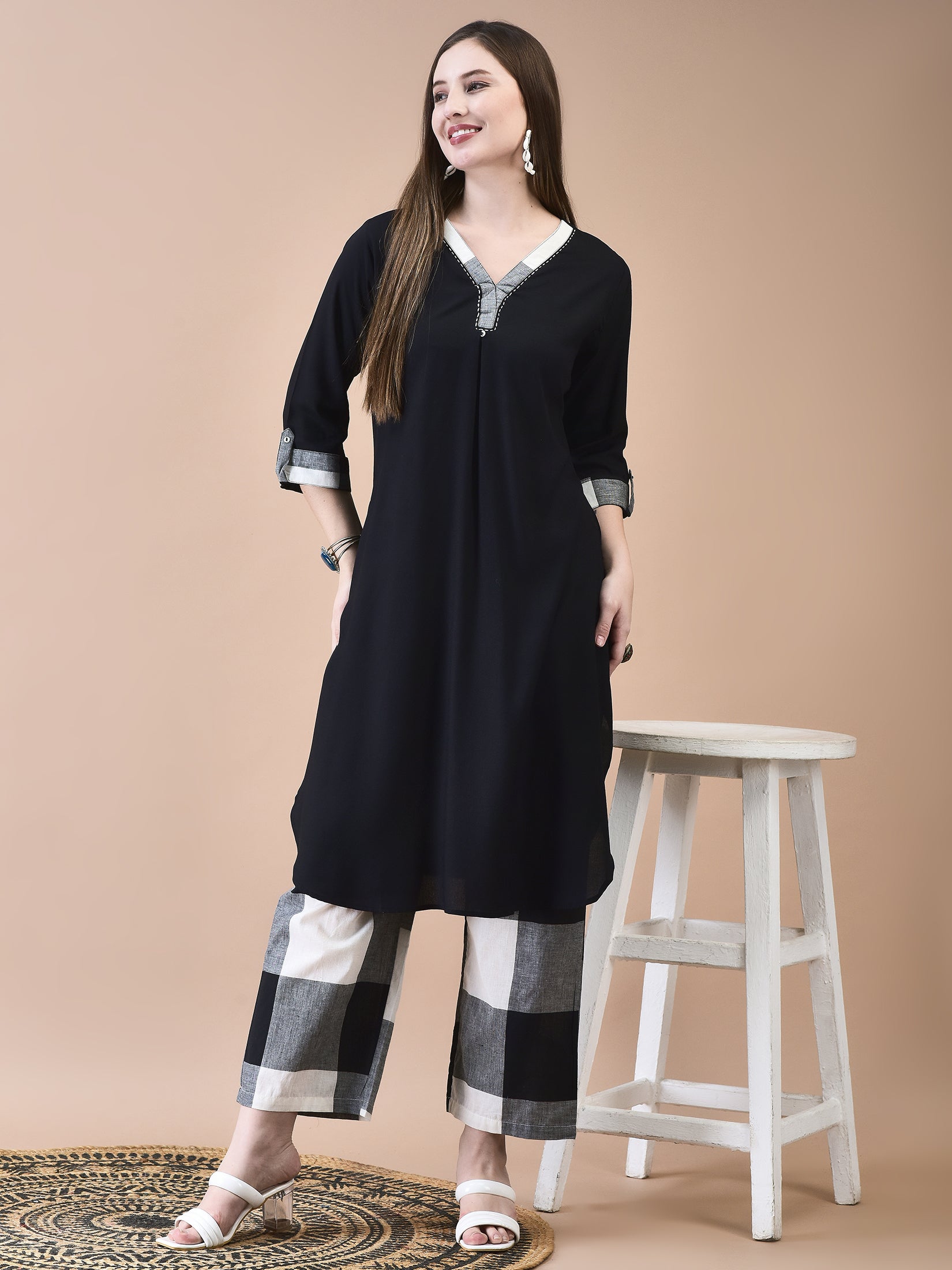 Women Liva (Rayon) Black Solid Kurta With Cotton Comfort Pant