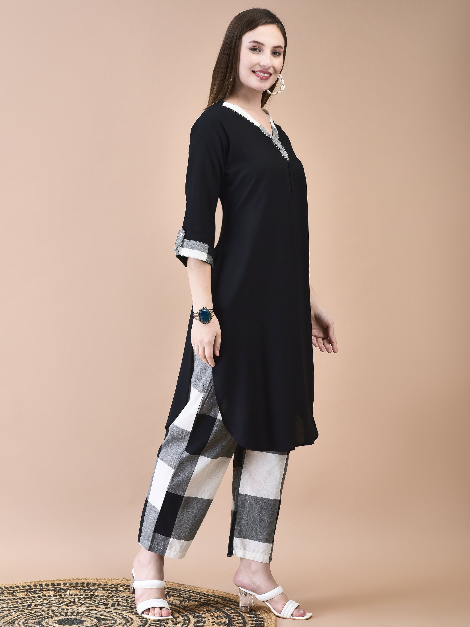 Women Liva (Rayon) Black Solid Kurta With Cotton Comfort Pant