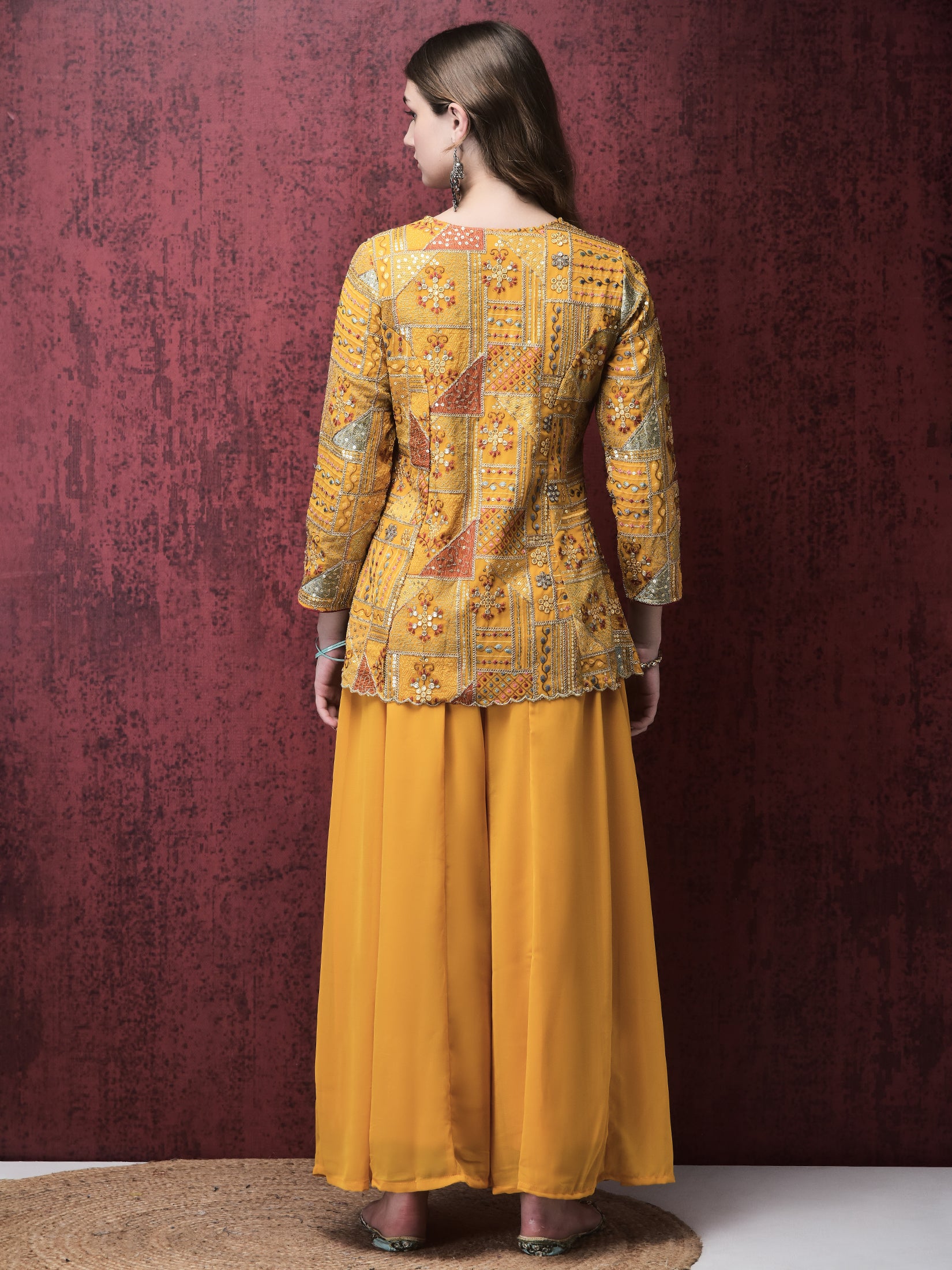 Women Georgette Yellow Embroidered Kurta With Flared Split Pant