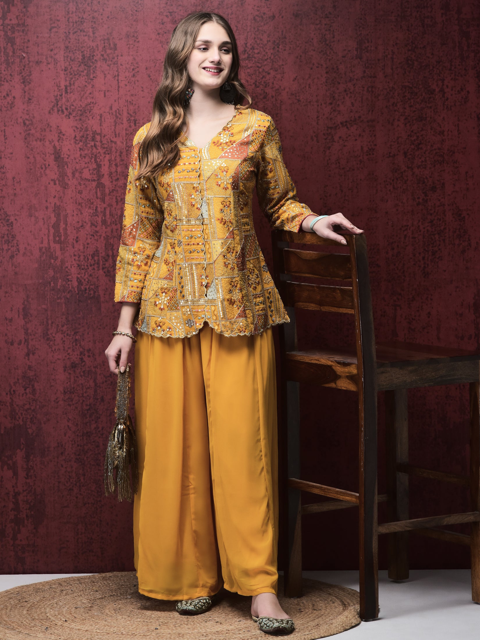 Women Georgette Yellow Embroidered Kurta With Flared Split Pant