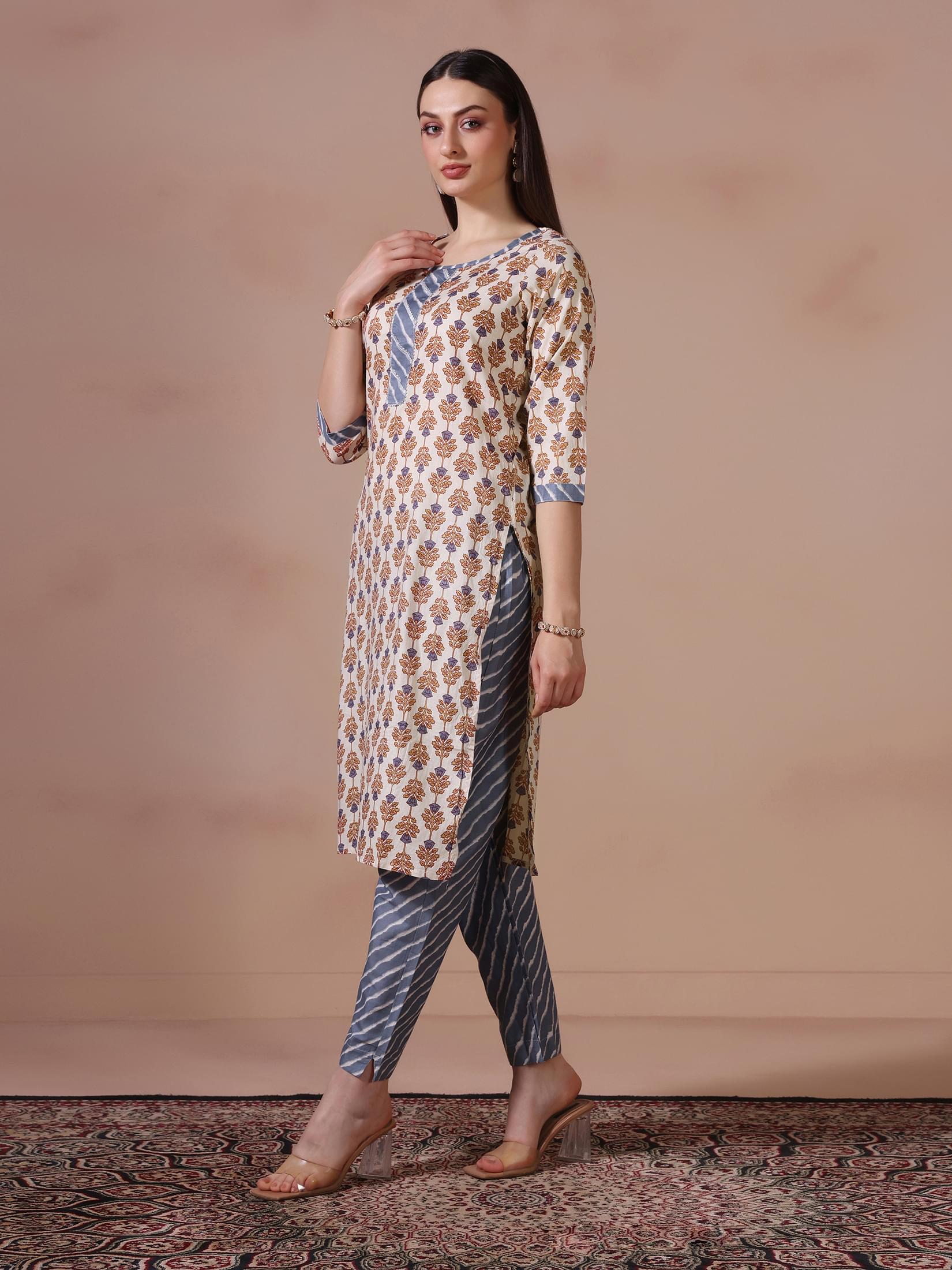 Women Cotton Cream Printed Kurta Trouser Dupatta.