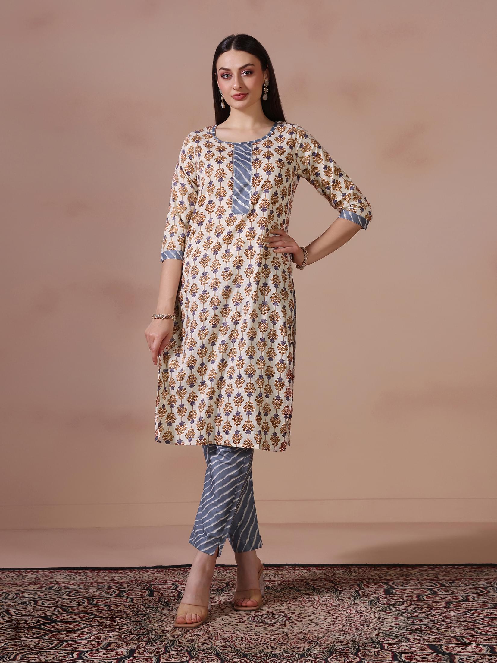 Women Cotton Cream Printed Kurta Trouser Dupatta.