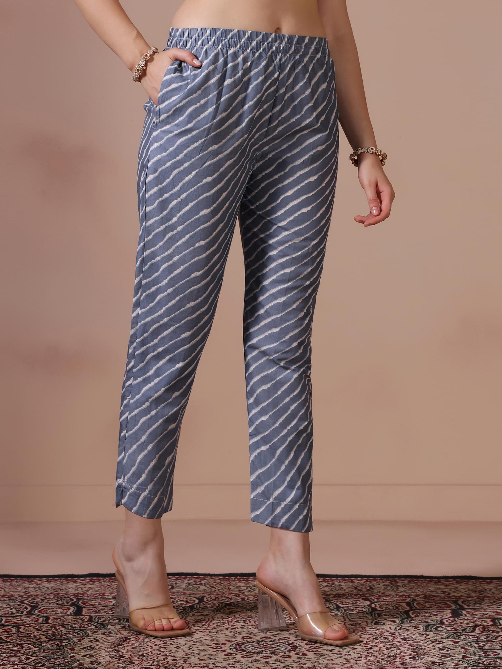 Women Cotton Cream Printed Kurta Trouser Dupatta.
