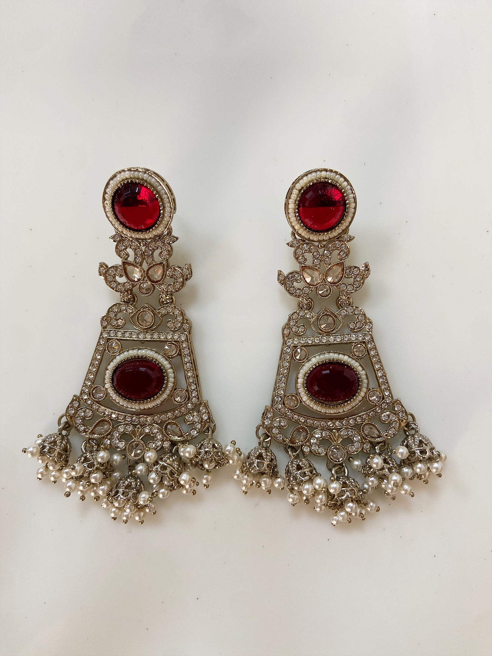 Intricate Kundan Jhumkas With Maroon Stones